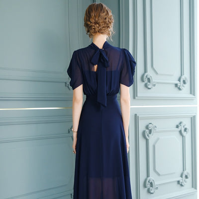 Elegancka Granatowa Plisowana Sukienka w Stylu Vintage