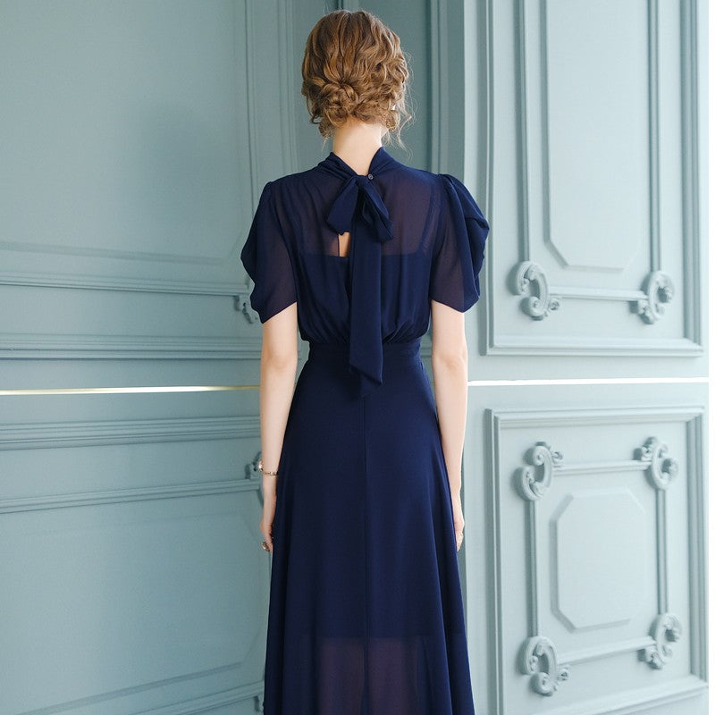 Elegancka Granatowa Sukienka Plisowana w Stylu Vintage