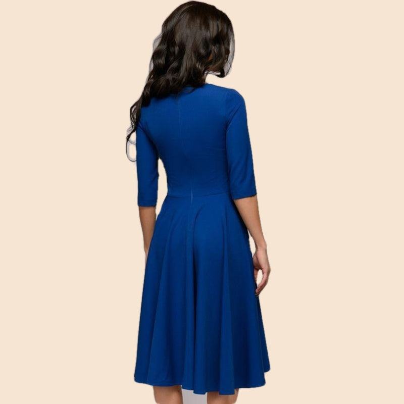 elegancka sukienka vintage z paskiem retro niebieska