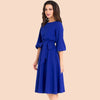 elegancka sukienka vintage z bufiastymi rękawami niebieska